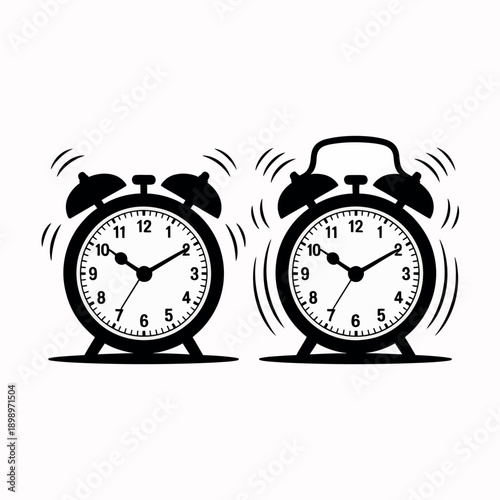 Two alarm clocks ringing loudly