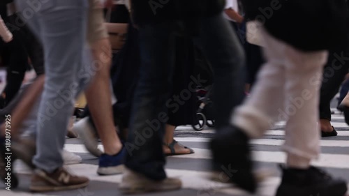 Low Angle View of World's Busiest Crosswalk Focus On Feet
