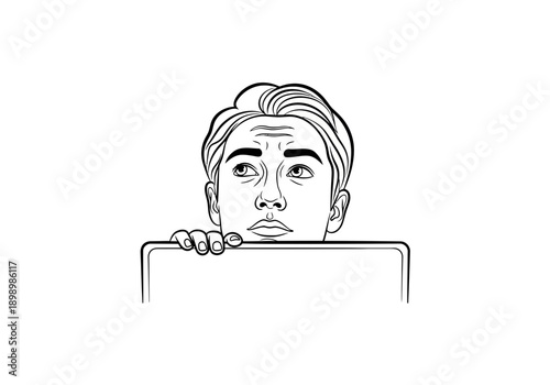 Man Peeking Over Laptop Screen Looking Upwards.