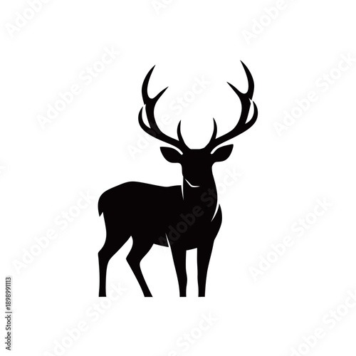 A striking black silhouette of a majestic deer with large antlers standing against a clean white background, showcasing its elegant form.
