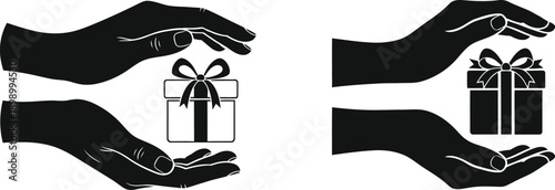 Two black silhouettes of hands carefully holding a gift with a bow
