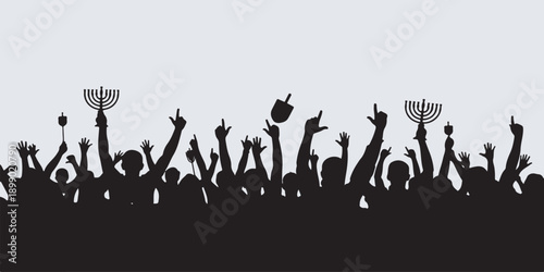Silhouette of a crowd celebrating Hanukkah with menorahs and dreidels held high against a light background.