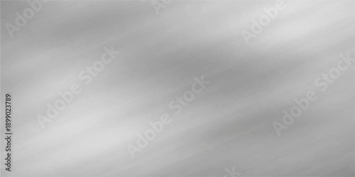Brushed silver metal texture background with smooth shiny surface and subtle reflection
