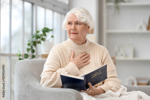 Christian senior woman with...