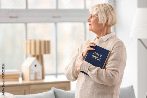 Christian senior woman with...