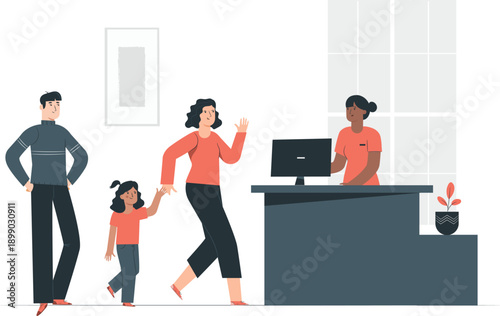 Family checking in at a hotel reception desk with a friendly receptionist