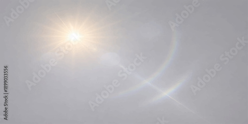 Sun shining through clouds in blue sky