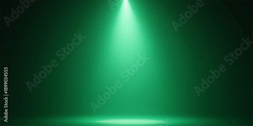 Green spotlight shining on stage with abstract background