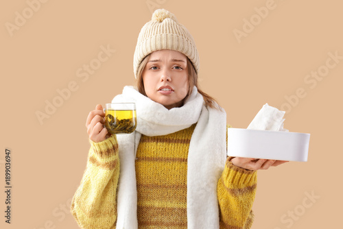 Ill young woman in winter c...