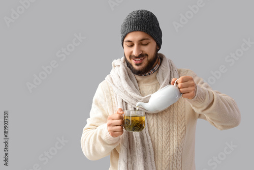 Young man in winter clothes...