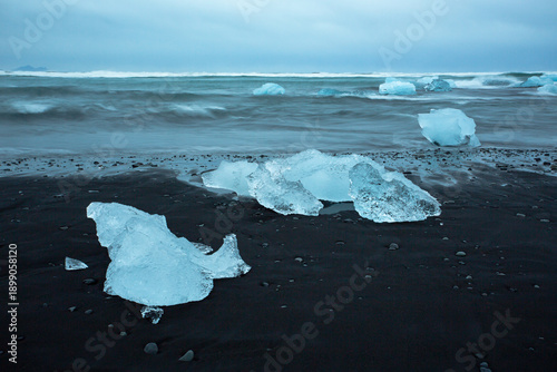 Blue Ice Chunks On Washing Up Beach