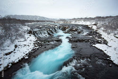 Vibrant Blue Running Over Black Ground