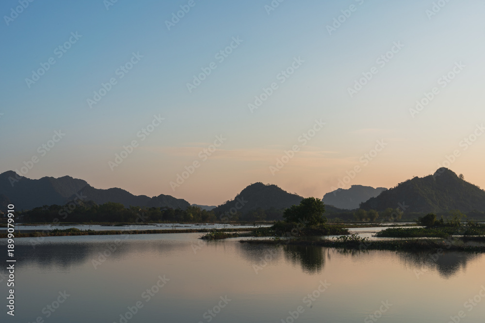 Ταπετσαρία Tranquil Wetlands and Mountains at Dusk in Ninh Binh, Vietnam