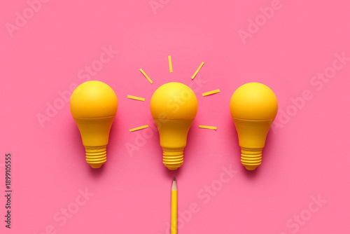 Yellow light bulbs on pink ...
