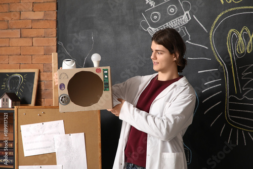 Male inventor with device i...