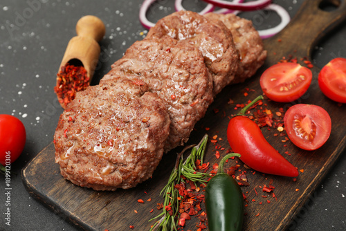 Wooden board with tasty mea...