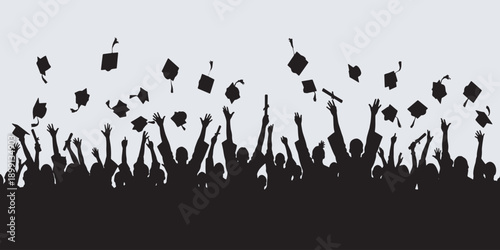 A silhouette of a large group of graduates celebrating by throwing their caps in the air against a light background.