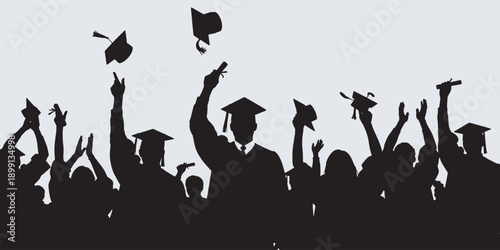 Silhouette of graduating students throwing their caps in the air, celebrating their achievement and success.