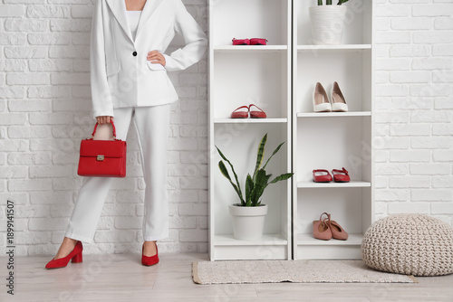 Elegant woman with red heel...