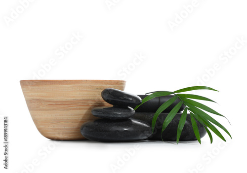 Spa stones, wooden bowl and...