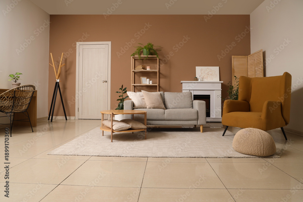 Fototapeta premium Interior of stylish living room with sofa, armchair and soft carpet