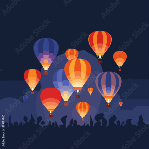 Vibrant hot air balloons glowing brightly in the night sky above a silhouetted landscape, creating a magical festival atmosphere.