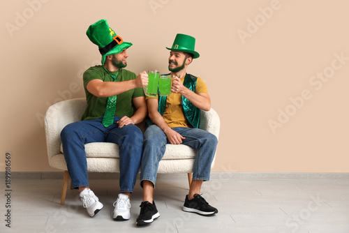 Young men in leprechaun hat...