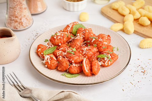 Plate of tasty gnocchi with...