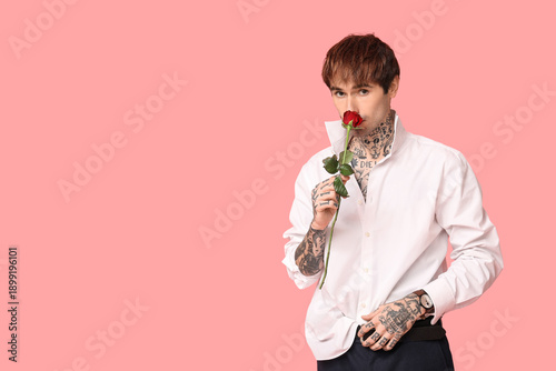 Handsome young man with ros...