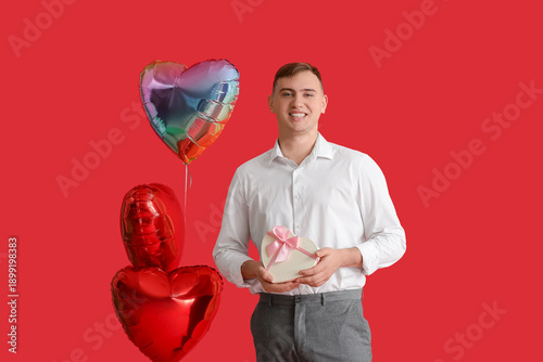 Handsome young man with gif...