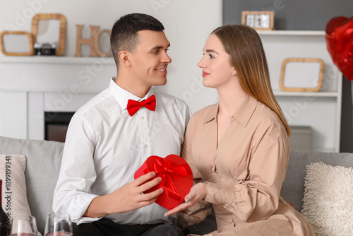 Beautiful young couple with...
