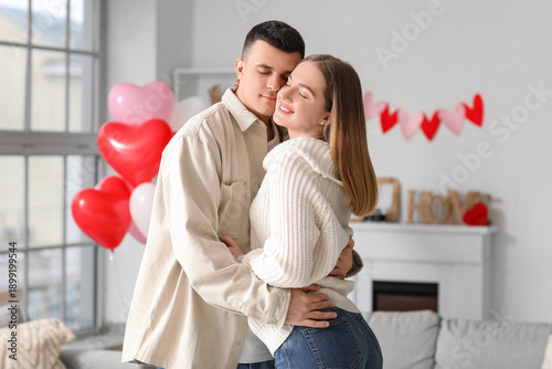 Beautiful young couple with...