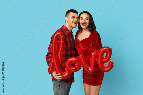 Loving young couple with ba...