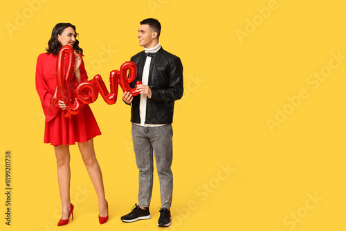 Loving young couple with ba...