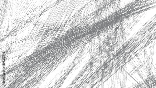 Dense grey scribbled lines overlaying white background with varied density and direction texture