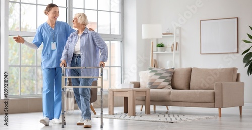 Caregiver and senior woman ...