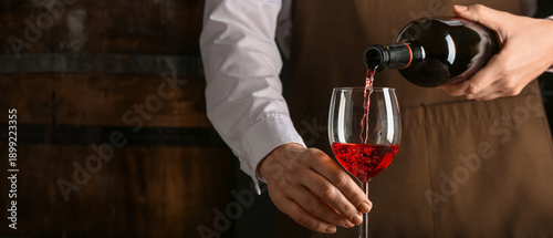 Female bartender pouring re...