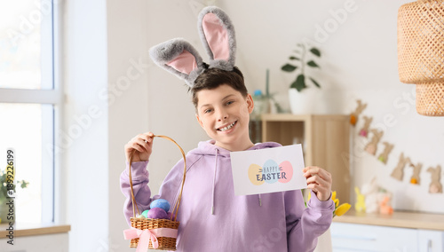 Teenage boy with Easter egg...