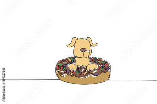Single line drawing of playful cute animal shows brown dog lying inside sweet donut for unhealthy food concept. Colorful art is perfect for an international food day theme with an adorable pet mammal
