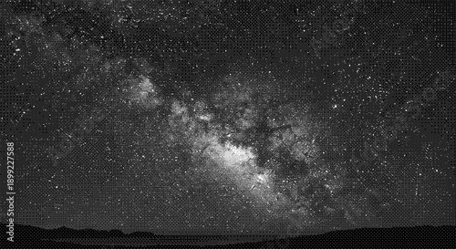 A breathtaking night sky view of the Milky Way galaxy with numerous stars shining brightly above a dark landscape.