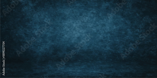 A dark blue grunge background features a textured vintage wall pattern with an aged paper feel and blank copy space on a rough dirty paint backdrop for design