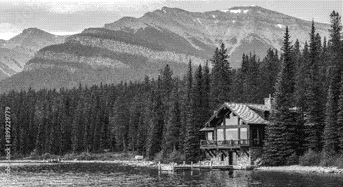 Serene lakefront log cabin surrounded by dense evergreen trees with majestic mountains in the background