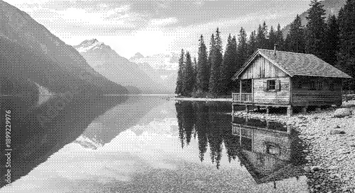 Serene lake scene with wooden cabin and majestic mountains reflected in calm waters