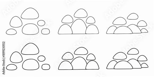 An arrangement of abstract overlapping organic shapes in black and white