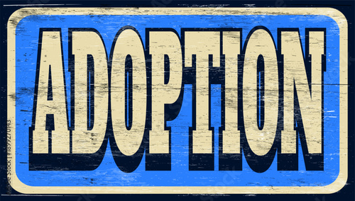 Aged retro adoption sign on wood