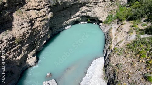 a lake in a stone canyon. a river between rocks.