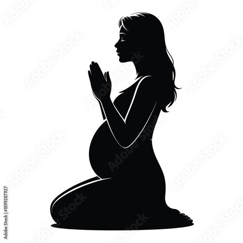Pregnant woman in silhouette kneeling with hands pressed together in prayer