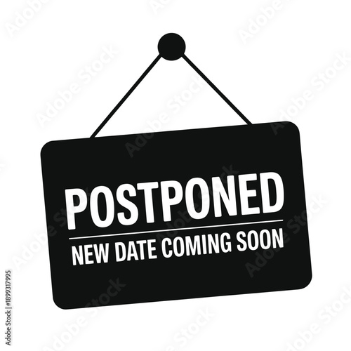 A black sign announces a postponement promising a new date will be revealed