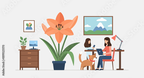 Two women and a dog work on laptops near a large orange flower in a home office