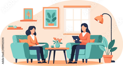 Two women in comfortable chairs in a room, one on a tablet